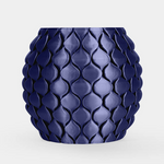 A glossy dark blue textured planter pot with a raised leaf-like pattern, centered on a light gray background.